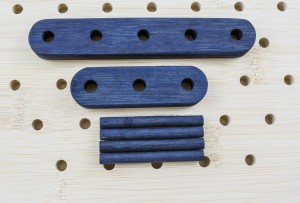 Dark playing pieces are dyed with indigo.